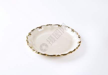 空装饰板金子甜点餐具制品圆形陶瓷边缘白色陶器古董高清图片