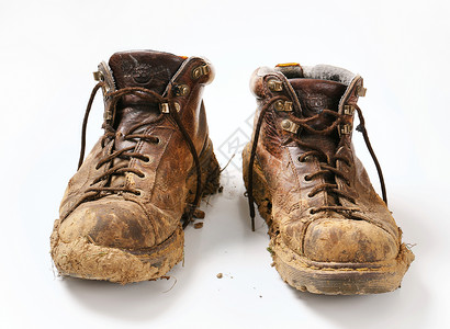 泥靴黏土鞋带棕色鞋类土壤衣服皮革背景图片