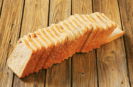 整个小麦三明治面包木头乡村食物背景图片