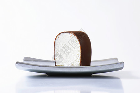 巧克力涂巧克力的棉花糖酥皮白色食物奶油糖果甜点蛋糕软糖背景图片