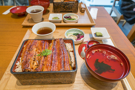 蒲烧鳗鱼饭大米 乌拿胡瓜 日本菜豆午餐美食食物泡菜酱油鳗鱼营养海鲜餐厅食品背景