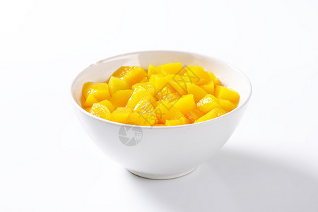 罐桃子罐头小吃玻璃罐装水果立方体甜点糖浆食物背景图片