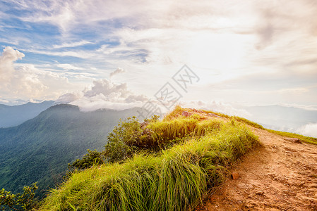 FA泰国Phu Chi Fa森林公园日落山脉太阳场景顶峰景点环境薄雾旅行旅游石头背景