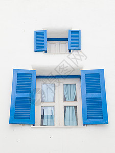 圣托里尼希腊风格的蓝色封闭窗背景图片