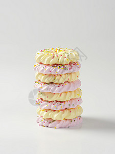 美花饼干粉色糖果食物花圈形小雨配料装饰黄色背景图片