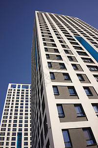 直角坐标系与 Windows 的公寓楼群几何学立面景观垂直房子大楼消失高层建筑设计背景背景
