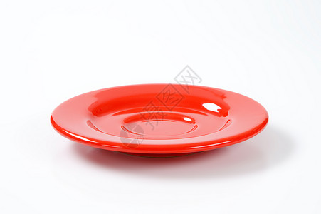 圆轮红碟陶器盘子制品餐具陶瓷红色瓷器背景图片
