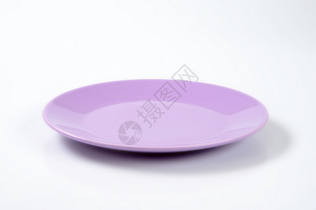浅紫花板餐具紫色纯色早餐圆形陶器餐盘制品陶瓷背景图片