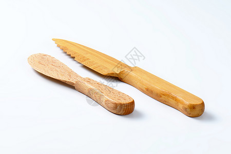 两把木制刀设备锯齿状餐具厨房用具高清图片