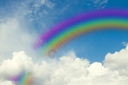 蓝色天空中的彩虹插图天气阳光背景图片