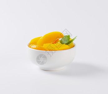 罐装桃子切片水果罐头食物背景图片