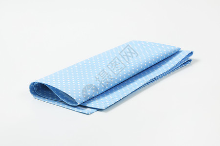 绿绿宝石地垫子织物台垫纺织品棉布蓝色折叠餐巾背景图片