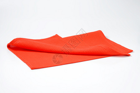 红垫红色织物桌布台垫棉布折叠纺织品背景图片
