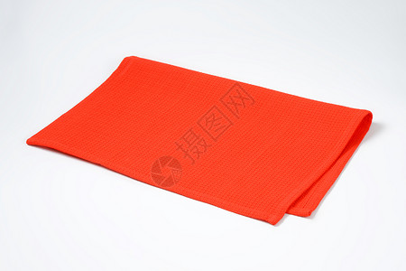 红垫红色棉布桌布织物台垫纺织品折叠背景图片
