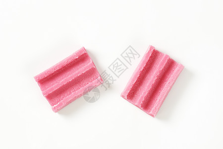 粉色咀嚼口香糖高架糖果食物矩形背景图片