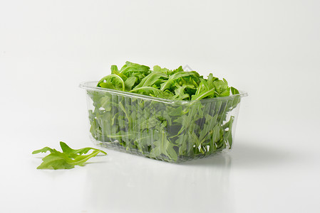 罗盖特新鲜树叶叶沙拉蔬菜食物塑料火箭营养草本植物背景