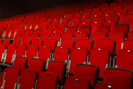 红色剧院椅子戏剧天鹅绒会议歌剧体育场座位场景电影礼堂展示背景图片