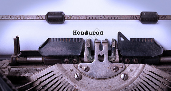 旧打字机     洪都拉斯国家记者备忘录机械白色打印调子作家金属技术背景图片