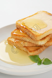含黄油和蜂蜜的吐司面包面包团体食物早餐高清图片