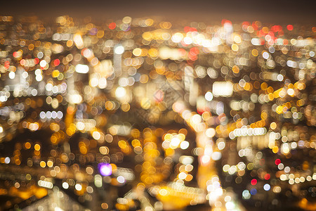 城市的灯光失去焦点城市生活高架背景夜生活柔焦视图运动高角度路灯背景图片