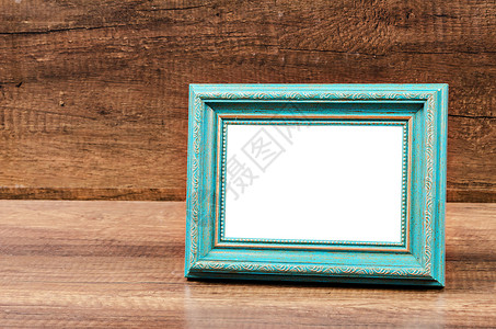 木制房间的蓝色空白照片框框架剪裁广告木头小路画廊长方形艺术背景图片