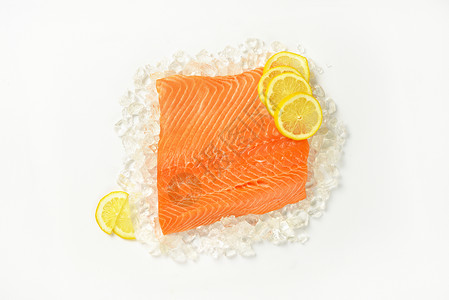 冰上鲜鲑鱼片鱼片高架柠檬食物营养高清图片