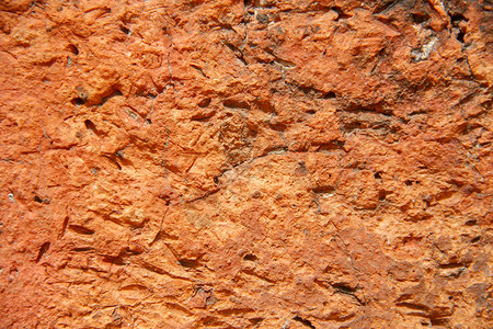 旧粘土块的质地纹理石工风格橙子石墙粮食石方砖块墙纸石头背景图片