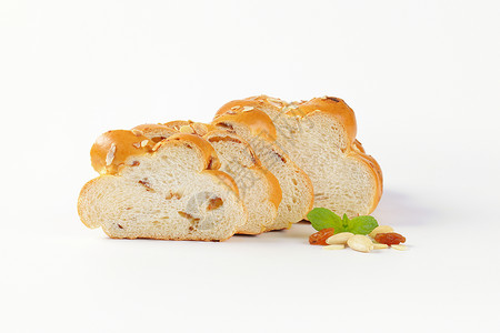 切片甜甜的面包面包杏仁葡萄干酵母美食沙拉食物背景图片