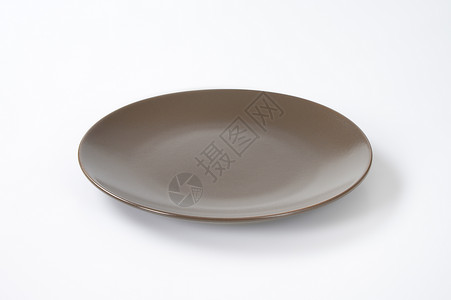 空白棕色板陶器轿跑车板夹层板棕色餐盘餐具圆形纯色背景图片