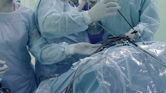 腹部的拉帕罗斯外科手术程序内窥镜乐器卫生蓝色疾病腹腔镜手套医生医院背景