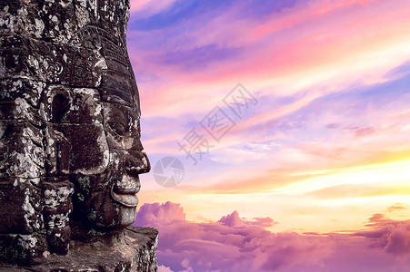 汤姆Bayon寺庙日落时古老的石头面孔 柬埔寨Angkor Wat 暹粒建筑学考古学雕刻纪念碑艺术性上帝游客废墟宗教旅行背景