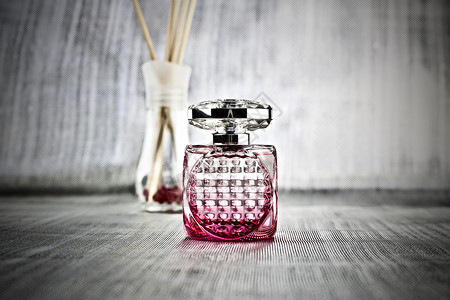 瓶装粉红香味背景图片