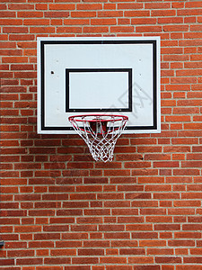 白色篮球网 挂在红砖墙上团队运动白网红墙砖墙背景图片
