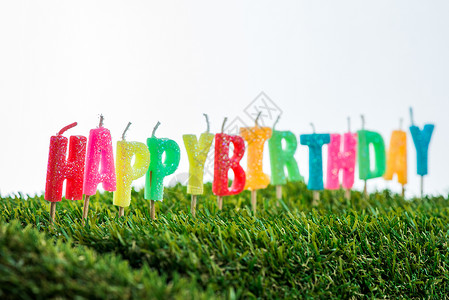 生日快乐创意字生日蜡烛儿童庆典绿色水平公园地面乐趣派对装饰背景