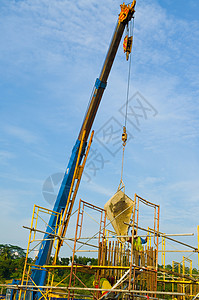 建筑工地蓝色进步工程商业城市脚手架劳动项目水泥起重机背景图片