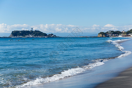 南滨上院千崎市的光南海滩海滩海洋城市蓝色天空晴天假期地标太阳支撑背景