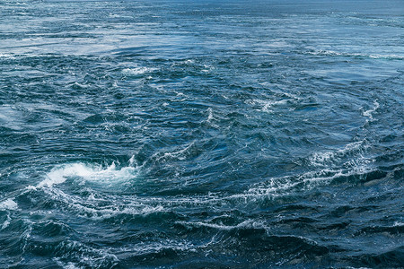 德岛的鸣笛游客四国涡流天空海浪晴天漩涡海峡阳光旋转背景图片