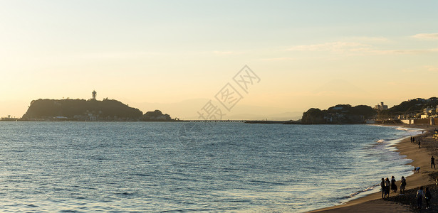 尤伊奇日落时休南的尤伊加哈马海岸蓝色白色海滩海洋太阳旅行天空景观城市支撑背景