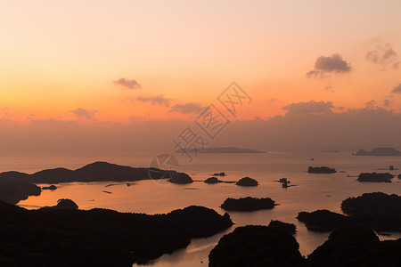 国仓岛日落地标农村海景天空晴天太阳天际阳光港口海洋高清图片