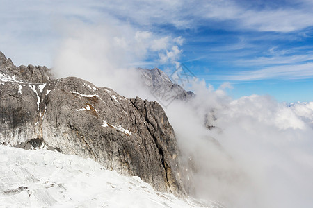 玉龙雪山旅行目的地天空旅游背景图片