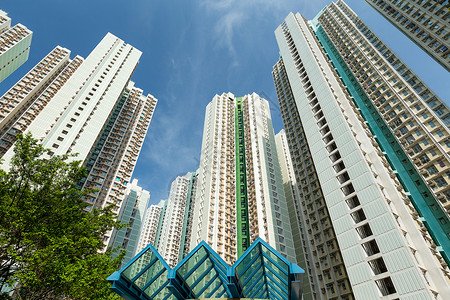 高楼到天上城市财产密度公寓住房居民蓝色建筑民众景观背景图片