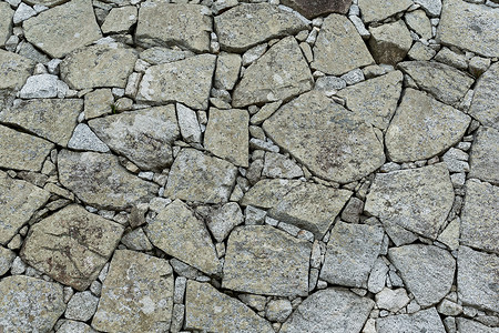 岩壁纹理瓦砾水泥砂浆石头房子砖墙古董城堡建筑学裂缝背景图片