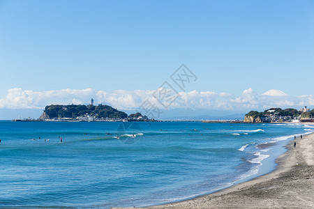 茅苍术千崎市的光南海滩冲浪板运动城市蓝色海浪天空海岸海洋冲浪海滩背景