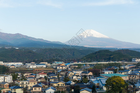 富士山和静冈镇市中心建筑风景晴天吸引力房子火山地标蓝色日落背景图片