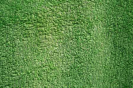 毛巾材料上的绿色纹理背景图片