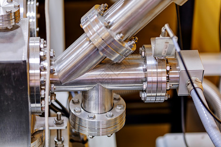 物理实验室的机械详细分类图磁铁数控粒子放射性原子辐射力量合金制造业研究所背景图片