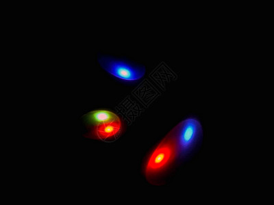 深色背景中的彩色球体光橙子电子俱乐部蓝色液体圆形工作室黑色活力力量背景图片