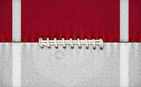 足球纹质游戏猪皮运动白色鞋带红色背景图片