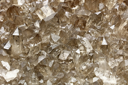封闭的石英矿晶体团岩石材料水晶矿物学矿物宝石宏观编队棕色边缘背景图片