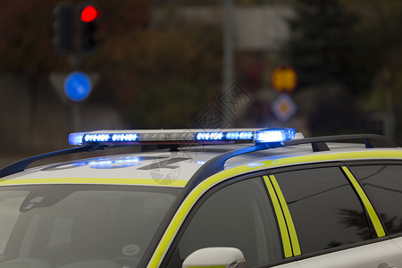 瑞典警用车灯路灯警察蓝色执法背景图片